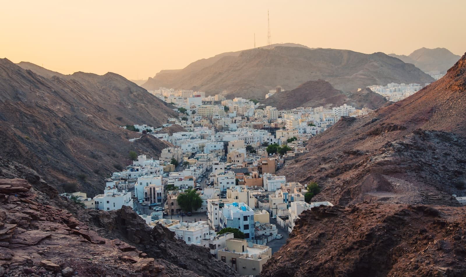 the forts of Muscat at dusk